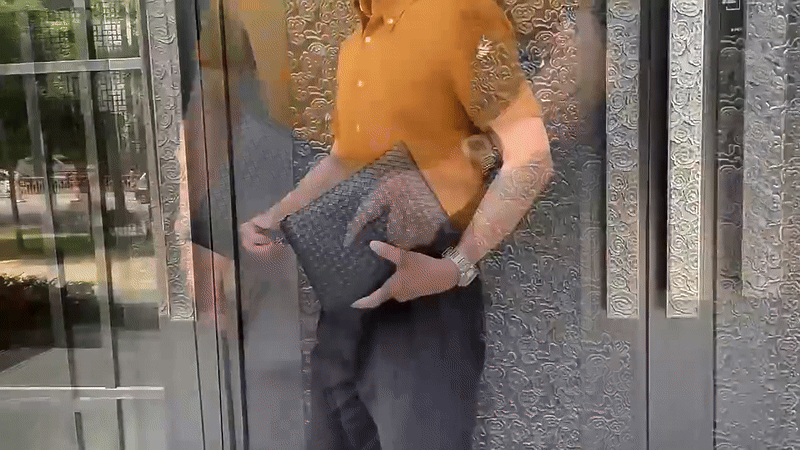 Pochette à main pour homme